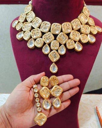 beautiful pure brass  kundan choker set with earrings and tikka