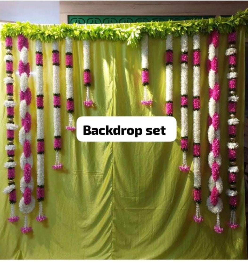 Parrot green Backdrop with fabric flower garlands and Jumbo green thoran 8/8 feet size